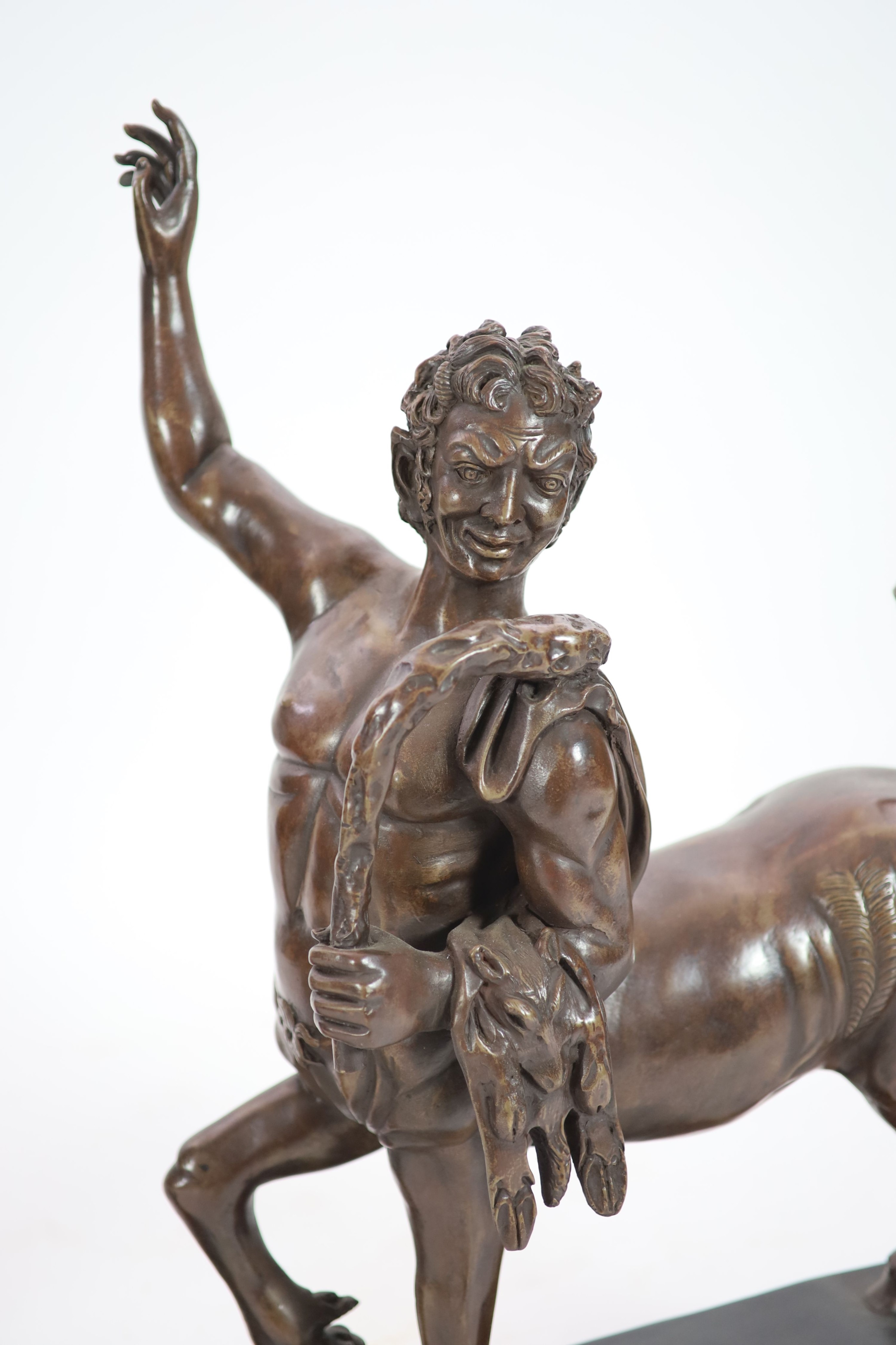 A pair of large faux bronze figures of centaurs, ex. Castlehyde House estate, Michael Flatley Largest H 91cm. L 56cm.